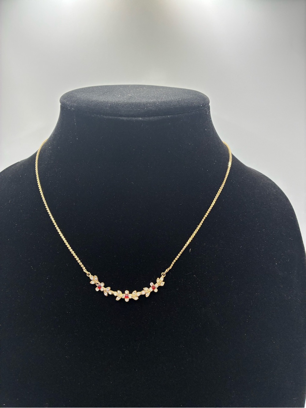 Gold Floral Necklace with Pink Accent Stones